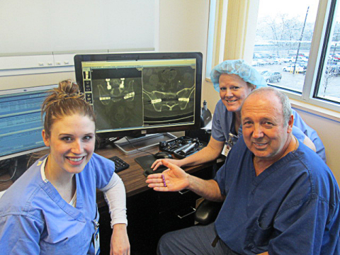 Dr. Wilson Asfora and his surgical team at Sanford Health. The video screen shows bilateral SAMBA(TM ... 