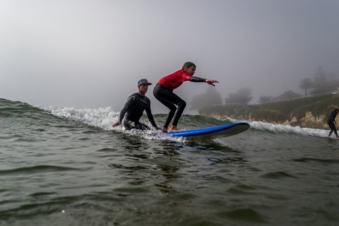 Professional surfer, Nathan Hedge and young man at the Surf Experience Day in Santa Cruz. (Photo: Bu ... 