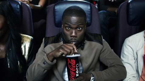 Kevin Hart enjoys a refreshing Coca-Cola Zero while on-set at the taping of the Coke Zero 