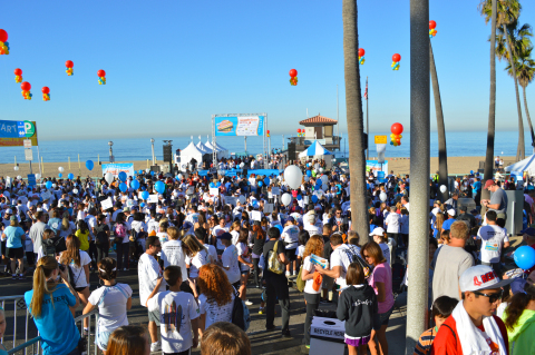 Thousands of community members participate in the annual SKECHERS Pier to Pier Friendship Walk (Phot ... 