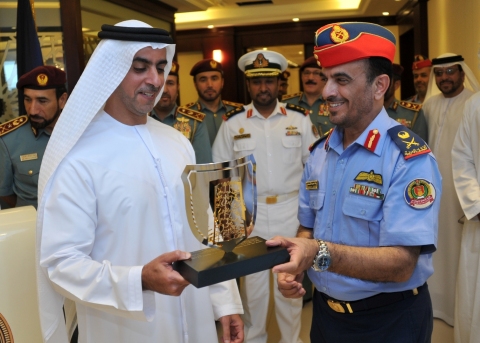 His Highness receives the college shield from Major General Al Saadi, NDC Commander (Photo: Business ...