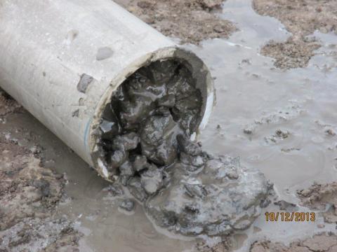 Core sample oozing with oil at surface (Photo: Business Wire)