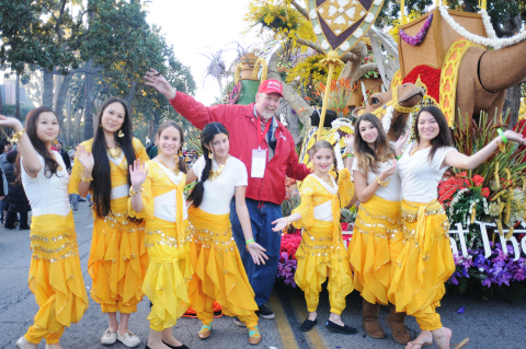Fiesta Parade Float president Tim Estes poses with dancers from the 125th Tournament of Roses Parade ... 
