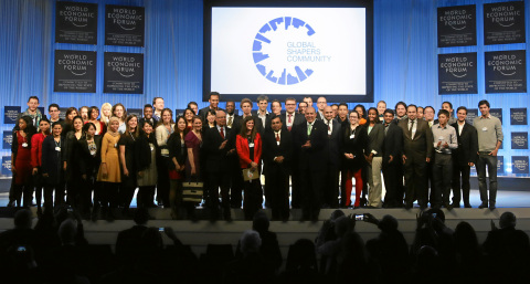 Muhtar Kent with Global Shapers at the 2013 Annual Meeting (Photo: Business Wire)  
