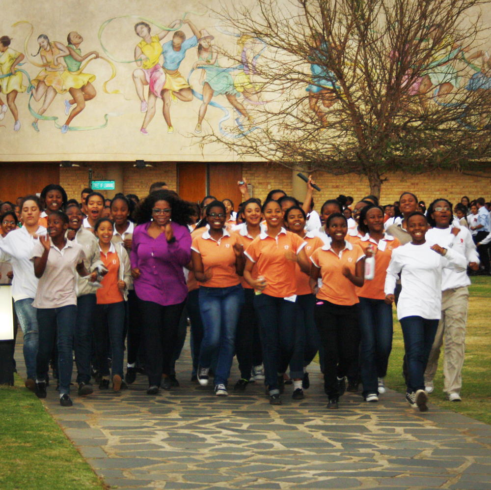 ADDING MULTIMEDIA Photos of Oprah Winfrey and students from Oprah