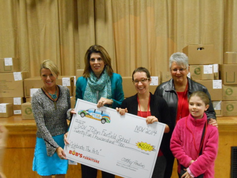 Cathy Poulin - Bob's Outreach Director, presents $25,000 check to Fairfield School Principle Maureen ... 