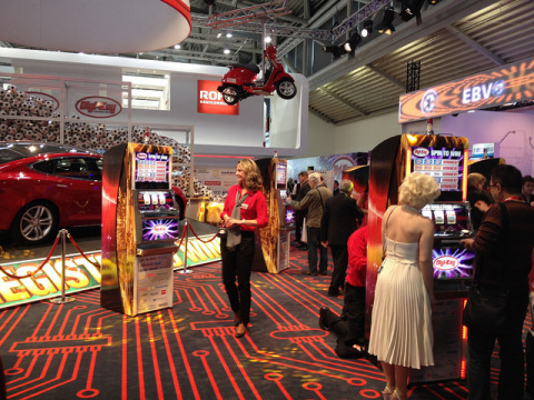 Booth participants were able to play on slot machines and socialize with famous impersonators. (Phot ... 