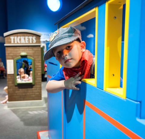 A young engineer pulls into the station on Sodor Island at the Thomas & Friends: Explore the Rails e ... 
