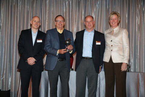 Digi-Key's Mark Larson (2nd from Left) and Chris Beeson (2nd from Right) receive the 2014 NPI Adopti ... 