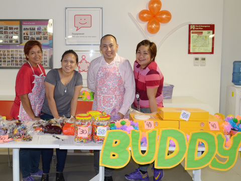 Wells Fargo Team Members selling candies and food stuff for their colleagues during the Fundraising ... 