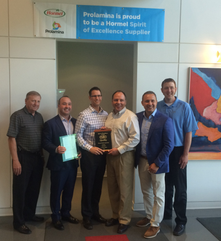 Hormel Foods and Prolamina executives with the 2014 Hormel Spirit of Excellence Award at Prolamina's ... 