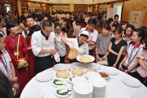 Careers@Hilton Live participants enjoy a cooking competition in the APAC region (Photo: Business Wir ... 