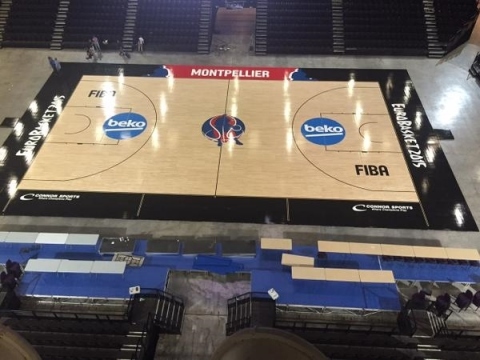 Custom portable basketball court installed at Arena de Montpellier by Connor Sports a Gerflor brand  ...