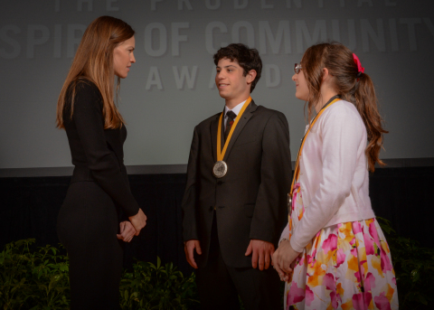 Academy Award-winning actress Hilary Swank congratulates Zachary Librizzi, 18, of Warwick (center) a ... 