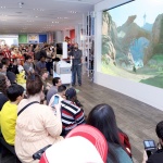 In this photo provided by Nintendo of America, Nintendo fans gather around the 15-foot gaming screen inside the Nintendo NY store on June 14, 2016 to watch the trailer for The Legend of Zelda: Breath of the Wild live-streamed from Nintendo’s booth at this year’s E3 video game trade show in Los Angeles. (Graphic: Business Wire) In this photo provided by Nintendo of America, Nintendo fans gather around the 15-foot gaming screen inside the Nintendo NY store on June 14, 2016 to watch the trailer for The Legend of Zelda: Breath of the Wild live-streamed from Nintendo’s booth at this year’s E3 video game trade show in Los Angeles. (Graphic: Business Wire)