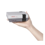 This new nostalgia-fueled system is a near-identical, mini replica of Nintendo's original home console and plugs directly into your high-definition TV using an included HDMI cable. (Photo: Business Wire) This new nostalgia-fueled system is a near-identical, mini replica of Nintendo's original home console and plugs directly into your high-definition TV using an included HDMI cable. (Photo: Business Wire)