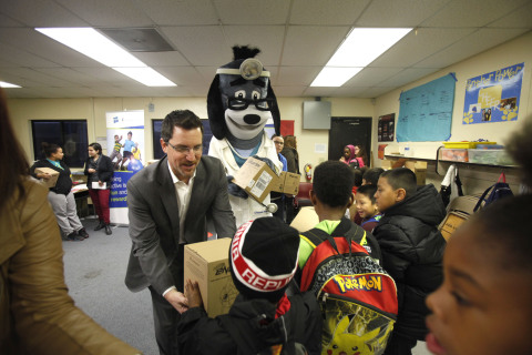 Kevin Kandalaft of UnitedHealthcare and mascot Dr. Health E. Hound passed out 150 NERF ENERGY Game K ... 