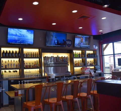 Interior shot of new East Coast Wings + Grill 2.0 (Photo: Business Wire)
