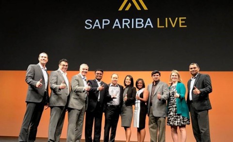 Executives from SAP Ariba and Accenture accept the SAP Ariba #MakeProcurementAwesome award for Premi ... 