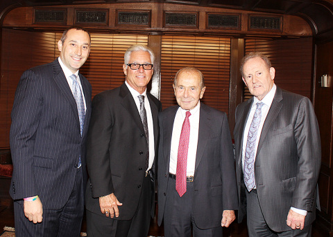 (L-R) Bryan Calka and Bucky Dent from the NY Yankees and Maurice R. Greenberg and Howard Smith from ... 