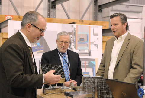 Christofer Mowry, President of B&W mPower, Inc., gives Dr. Peter Lyons, U.S. Department of Energy Assistant Secretary of Nuclear Energy, a tour of the B&W mPower Fuel Technology Center in Lynchburg, Va. (Photo: Business Wire)