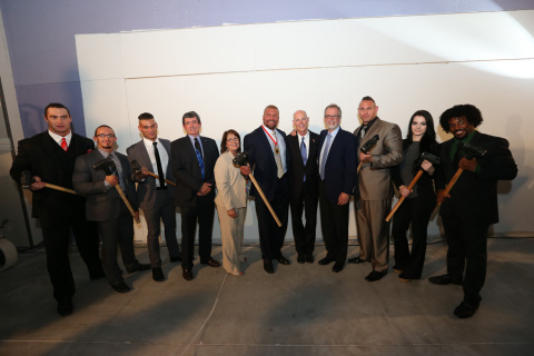 Left to right: Mason Ryan, Adrian Neville, Corey Graves, Peter Clarke, Orange County Commissioner, Teresa Jacobs, Mayor of Orange County, Paul "Triple H(R)" Levesque, Executive Vice President, Talent and Live Events, WWE, Rick Scott, Gov. of Florida, Garry Jones, President of Full Sail University, Conor O'Brian, Paige, Xavier Woods (Photo: Business Wire)