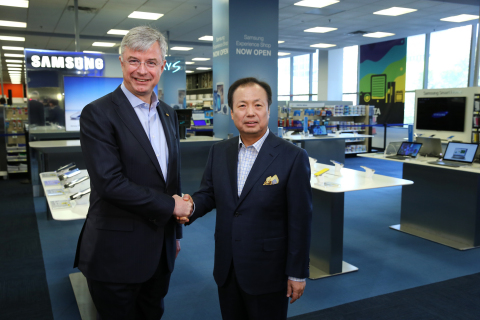Hubert Joly, CEO of Best Buy, and JK Shin, CEO and President of IT and Mobile Business at Samsung, officially opened the Samsung Experience Shops in the Best Buy Union Square store. (Photo: Business Wire)