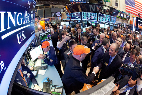 ING U.S. Chairman and Chief Executive Officer Rodney O. Martin, Jr. in the center of the trading crowd as the company’s stock opens on the NYSE. (Source: Ben Hider/NYSE Euronext Photo)