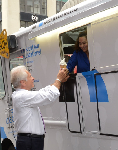 BankUnited Chairman, President and CEO John Kanas works on another sweet bank deal outside BankUnited's new branch at 960 Avenue of the Americas, one of the bank's three recently opened Manhattan branches (Photo: Business Wire)