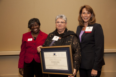 

Ms. Eunice Knouse, (center) Professor of Professor of Biology and Physical Science at Spartanburg Methodist College receives the 2013 Excellence in Teaching Award from Ms. Henri Baskins, (left) Chair of the SCICU Board of Trustees. Dr. Colleen Keith, (right) President of Spartanburg Methodist College was in attendance during the presentation of the award. (Photo: Business Wire)

