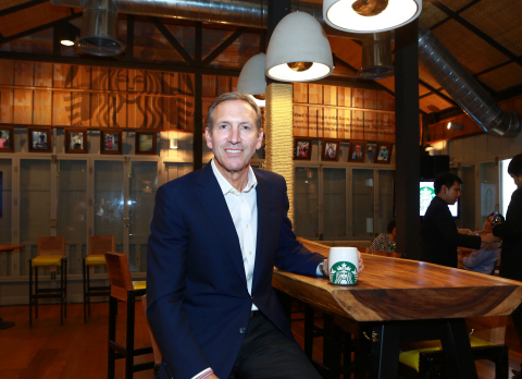 Howard Schultz, Starbucks chairman, president and ceo, celebrates 15 years in Thailand with partners and announces market will double store count over the next 5 years, as he commemorates first community store in Asia at the Langsuan store in Bangkok, Thailand. (Photo: Business Wire)