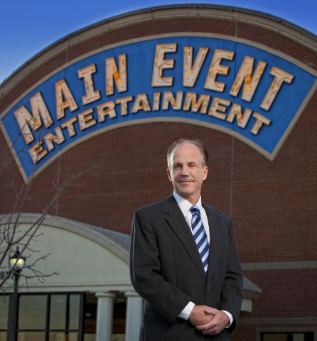 Main Event Entertainment's CEO Charlie Keegan in front of one of its newest family entertainment centers. (Photo: Business Wire)