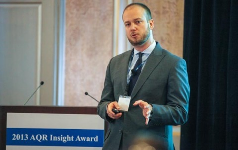 A 2013 AQR Insight Award prize winner, Matteo Maggiori, Ph.D., of the New York University Stern School of Business presents to the AQR Insight Award Committee on April 25, 2013, in Greenwich, Conn. Photo by Robert B. Sweig