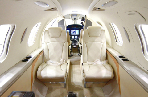 The fifth FAA-conforming HondaJet has a production interior with standard lavatory and options, including a side-facing seat. (Photo: Business Wire)
