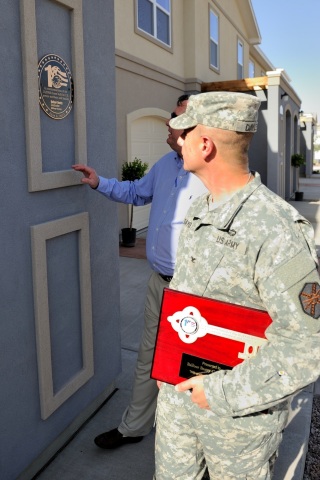 A plaque on a house in Fort Bliss, Texas commemorates the 10,000th military housing unit built by Balfour Beatty Construction. (Photo: Business Wire)