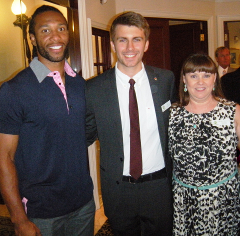 Arizona Cardinals Wide Receiver Larry Fitzgerald, Teen Lifeline's Peer of the Year, and Executive Director Michelle Moorhead (Photo: Business Wire)