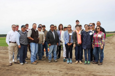 Members of STOP Foodborne Illness, including individuals sickened in outbreaks associated with leafy greens, pose for a photo along with government auditors and California Leafy Greens Marketing Agreement staff and members during a tour of a leafy greens farm in Oceano, CA. (Photo: Business Wire)