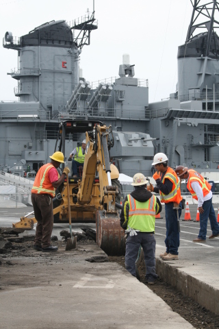 LIUNA volunteers excavating a trench to connect the USS Iowa to city utilities. (Photo: Business Wire)