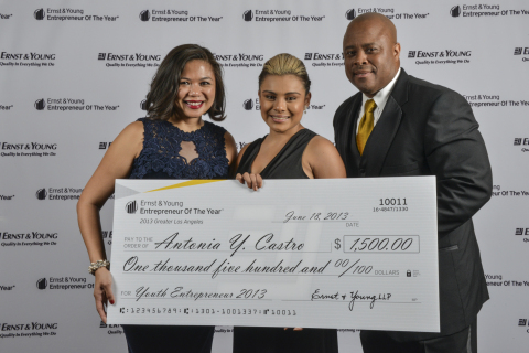 June 18, 2013 - Ernst & Young presents scholarship to Youth Entrepreneur, Antonia Castro, participant in Network For Teaching Entrepreneurship (NFTE) program in Los Angeles and founder of Cool Sleeve, at Entrepreneur Of The Year Awards Gala. From left to right Estelle Reyes, Executive Director, NFTE Greater Los Angeles; Antonia Castro, Founder, Cool Sleeve; and Leroy Hughes, Ernst & Young and board member of NFTE. (Photo: Business Wire) 