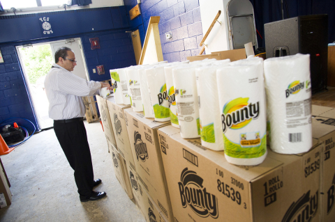 Principal John Cerniglia unloads a donation from Bounty paper towels to help clean-up damaged cafeterias, art classrooms and science labs in the aftermath of Hurricane Sandy at YCS George Washington Elementary School in Hackensack, NJ (Photo: Business Wire)