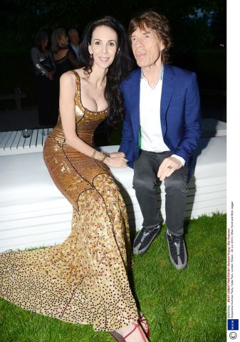 L'Wren Scott and Mick Jagger attend the Serpentine Summer Party 2013 (Photo: Business Wire)
