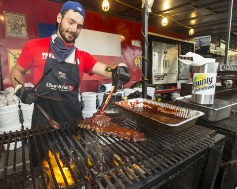 Texas Rangers ribber, Derek Buchanan, fires up the grill at Toronto Ribfest at Centennial Park, June 28 to July 1. (Photo: Business Wire) 