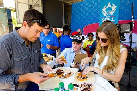 Teams of chefs from each military branch fired up the grill to create the best burger recipe in Washington, D.C. on Saturday, June 29. Carson Daly, Elaine Rodgers of the USO of Metropolitan Washington, and Brooklyn Decker put their taste buds to the test as celebrity judges during the grilling competition. (Photo: Business Wire)