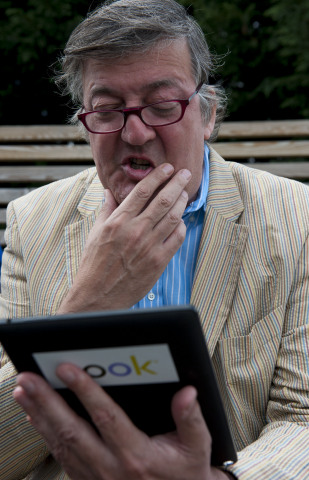 Stephen Fry reads Harry Potter and the Philosopher's Stone on a NOOK(R) HD+ tablet. Pottermore is donating 1,000 free eBook copies of Harry Potter and the Philosopher's Stone to be used on the 1,000 eReaders that NOOK has already donated to the Beanstalk literacy charity as part of the Get Reading campaign. (Photo: Business Wire)