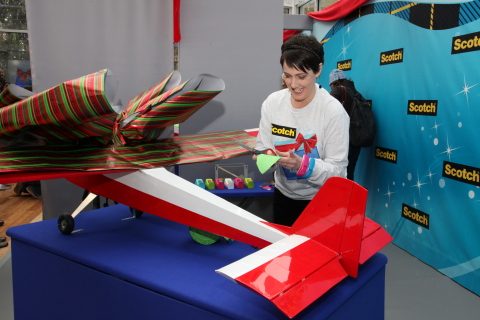 Lia Griffith, a gift wrapper from Portland, Ore. and the winner of the 2012 Scotch Brand Most Gifted Wrapper Contest, wrapped a giant model airplane with an eight-foot wingspan in the final round to win the $10,000 grand prize. (Photo: Ray Stubblebine)