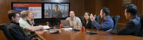 To create a natural classroom experience, the 23 conference rooms that students use for classes are equipped with two screens and Polycom(R) People+Content(TM) collaboration technology. The technology allows students to see instructors on one screen and content on the other. (Photo: Business Wire)