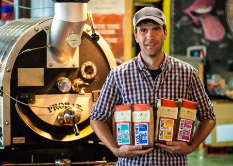 Just Love Coffee Roasters' Founder Rob Webb with New Love Ones Packaging (Photo: Business Wire)