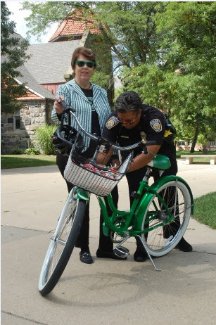 BikeGuard officially launched yesterday when the President of Eastern Michigan University, Susan Martin, registered her own bicycle. (Photo: The Eastern Echo)