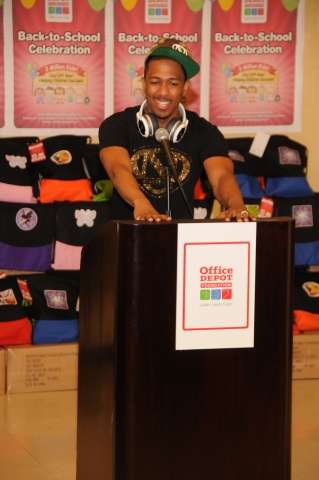 San Diego, Calif. - Nick Cannon speaks to some of the recipients of 3,500 Office Depot Foundation sackpacks during a Back-to-School Celebration event at an Office Depot store in San Diego. The nonprofit organizations and schools receiving the donations included: Bayside Community Center, Pazzaz Inc., Promises2Kids, Rolling Readers, San Diego Unified School District and YMCA of San Diego County (Photo Credit: Launey LeSage).