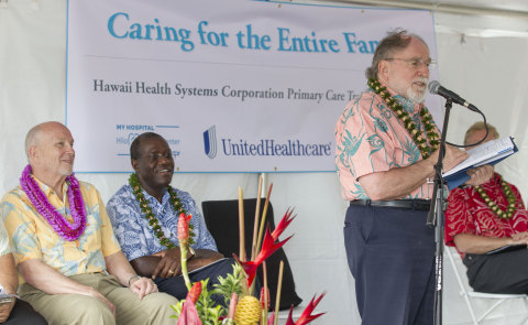 Hawaii Gov. Neil Abercrombie (right) speaks about the importance of health care in rural areas during a UnitedHealthcare grant check presentation event at the Hawaii Island Family Health Center on Monday, Aug. 19 as Vice Admiral (Ret.) John Mateczun (left), chief medical officer, UnitedHealthcare Military & Veterans, and Tony Welters (left center), executive vice president, UnitedHealth Group, look on. UnitedHealthcare, a UnitedHealth Group (NYSE: UNH) company, has awarded a $250,000 grant to support the primary care training program to help enhance primary care services for East Hawaii residents, including members of the United States military and their families, and to help train the next generation of physicians. (Photo: Eugene Tanner)